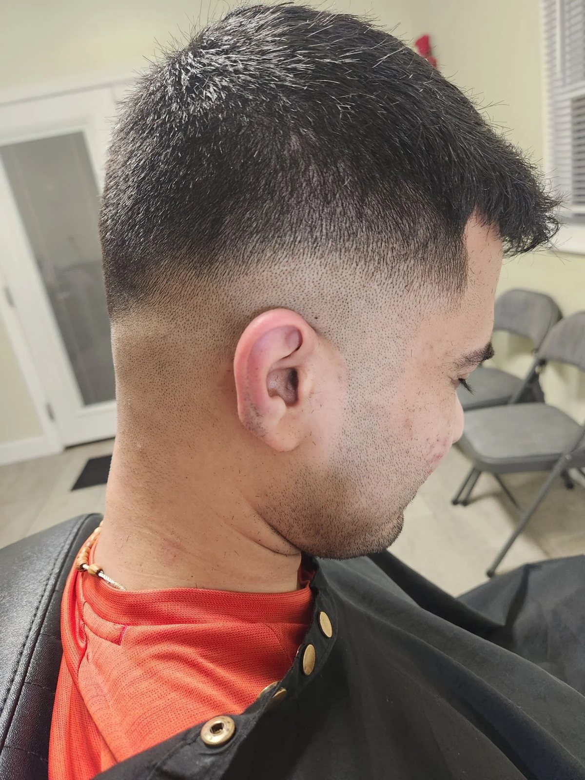 Auburn layered haircut at Happy Barber